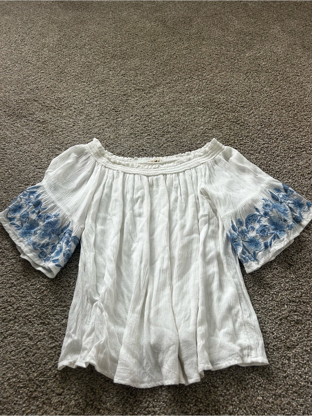 Hollister White Off-Shoulder Top with Blue Floral Sleeve Embroidery